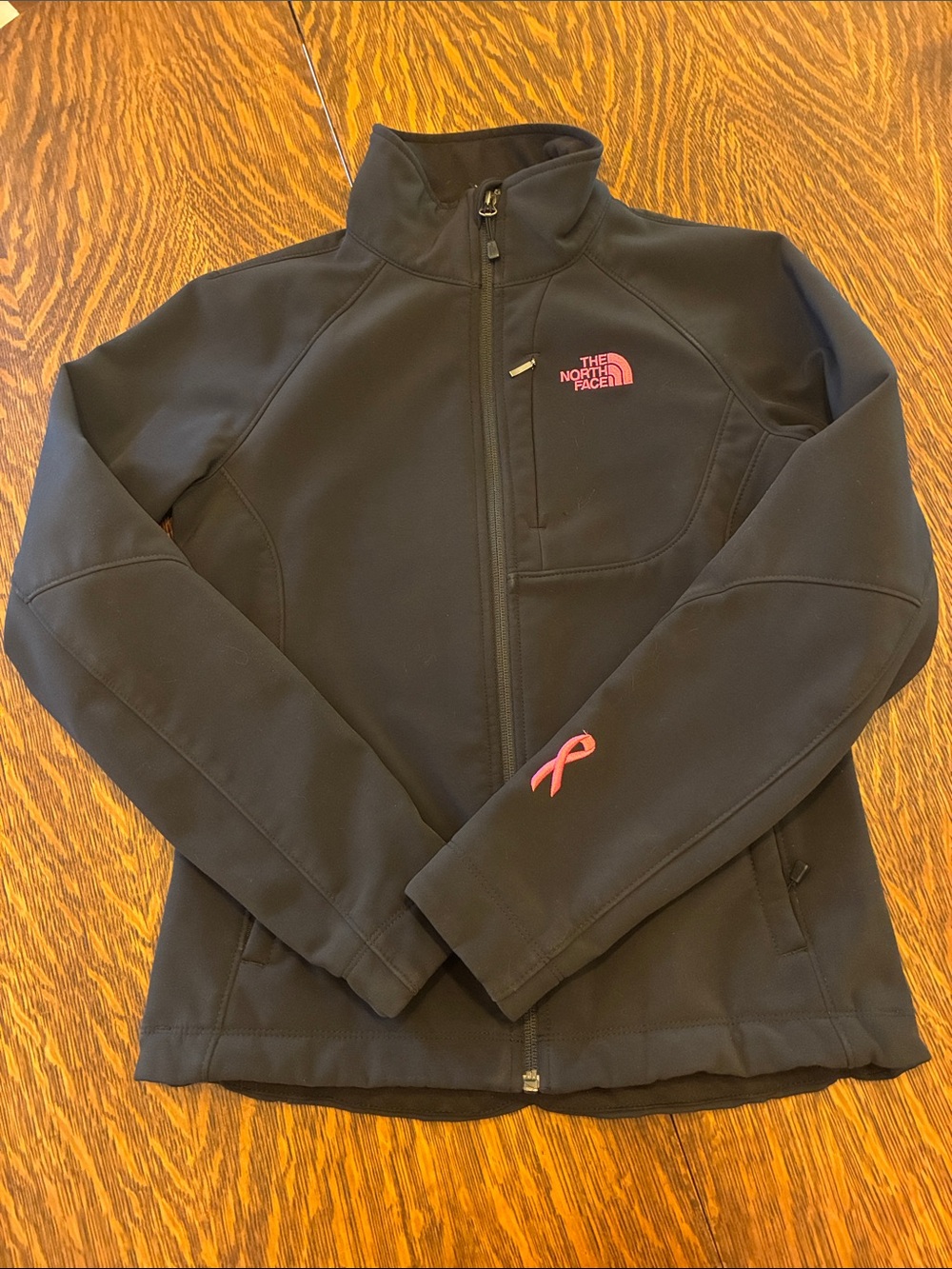The North Face Black Softshell Jacket with Pink Logo